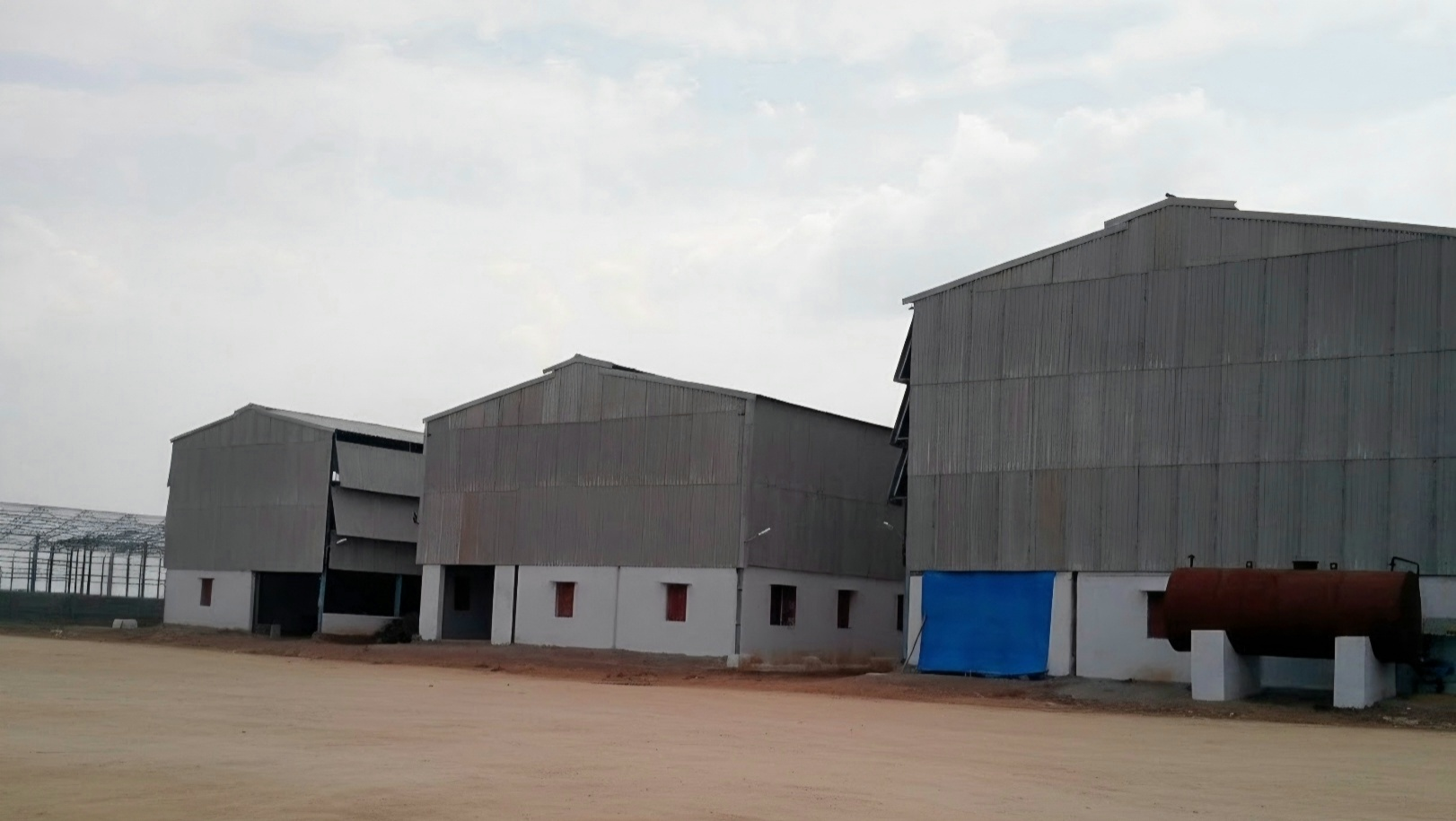 Exterior view of the S.S. Chemicals factory buildings and yard