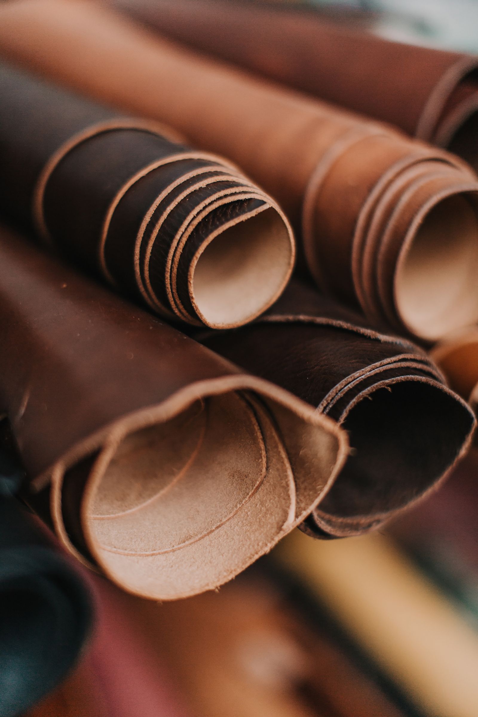 Close-up of textured brown and tan leather rolls